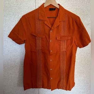 Men’s orange button up shirt